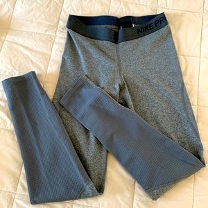 Nike Pro Dr Fit running tights Low Rise 26” inseam. No pockets